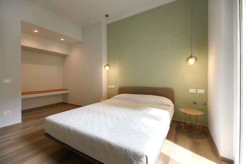 Postel nebo postele na pokoji v ubytování Bianca Elegance Rooms