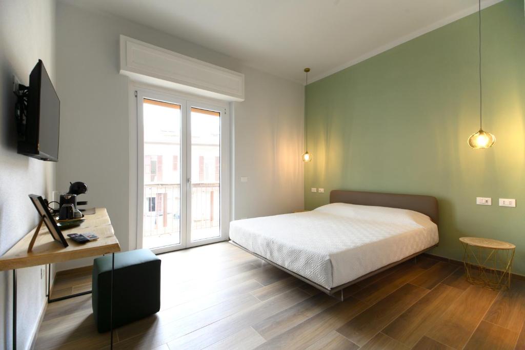 Postel nebo postele na pokoji v ubytování Bianca Elegance Rooms