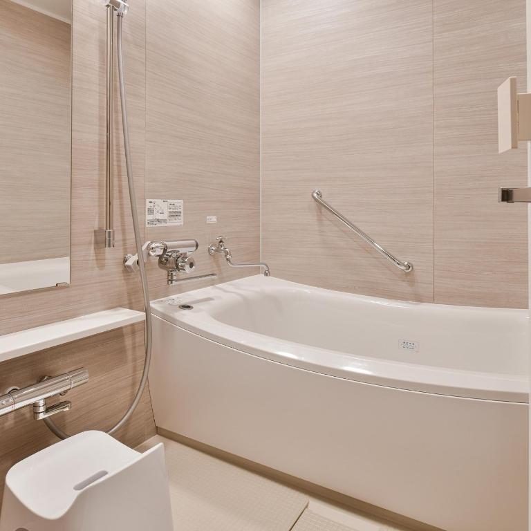 Koupelna v ubytování Lequ Okinawa Chatan Spa ＆ Resort