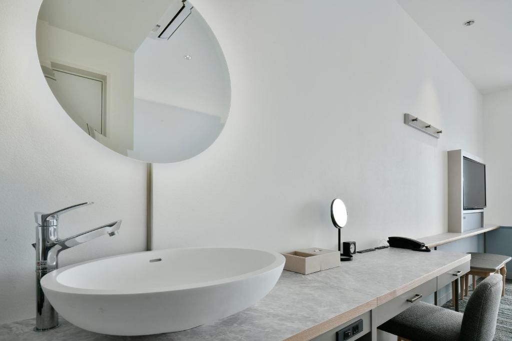 Koupelna v ubytování Lequ Okinawa Chatan Spa ＆ Resort