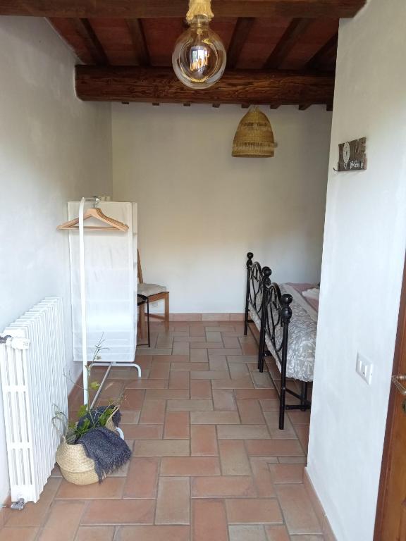 Postel nebo postele na pokoji v ubytování Casale - La Camera di Leda