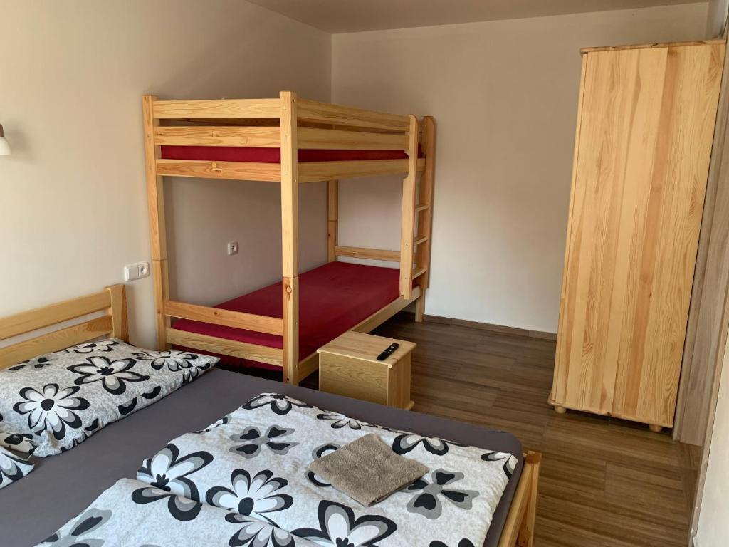 Postel nebo postele na pokoji v ubytování Penzion Pálava