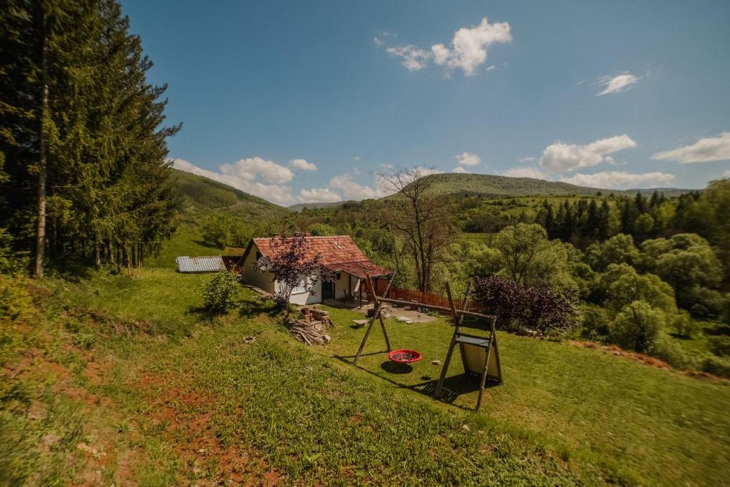 a house in the middle of a field at Kuca Lula Stara planina in Pirot