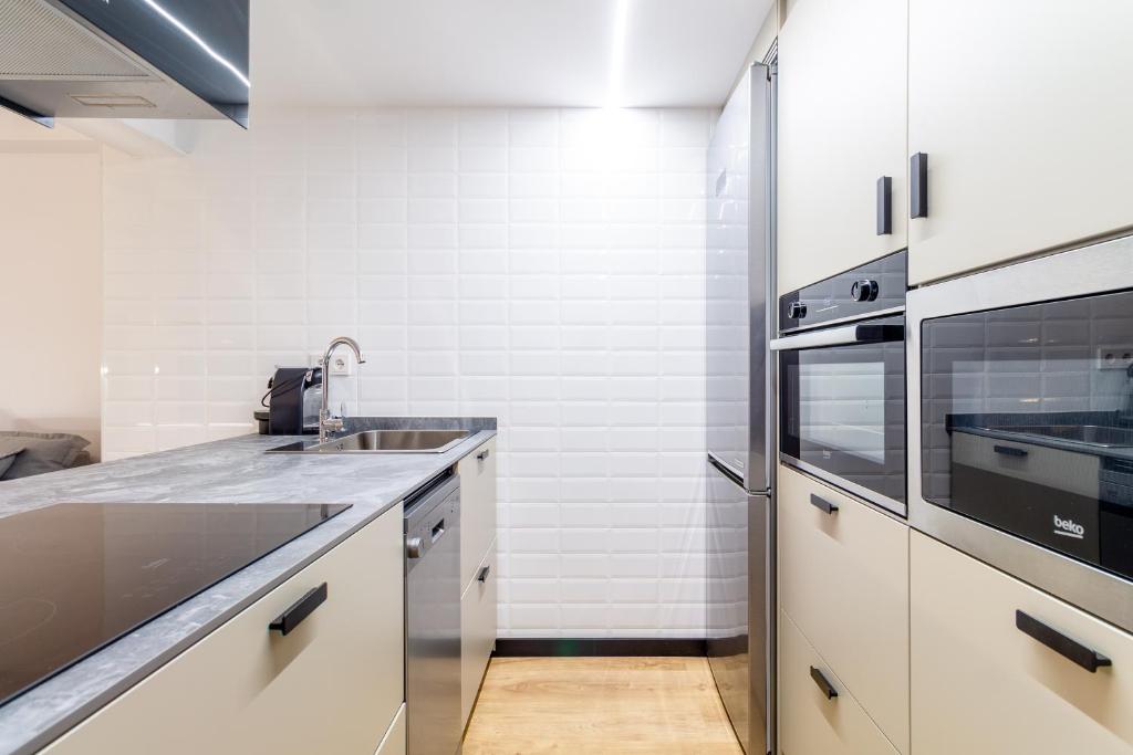 Kuchyň nebo kuchyňský kout v ubytování Premium apartment in Vigo
