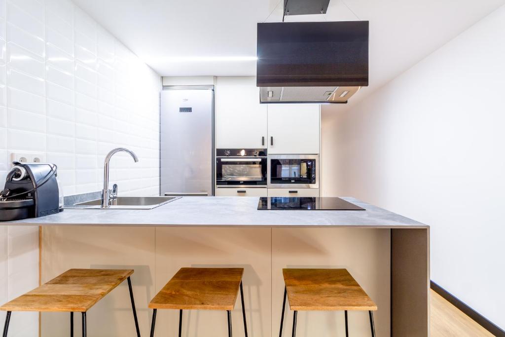 Kuchyň nebo kuchyňský kout v ubytování Premium apartment in Vigo