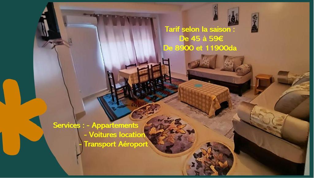 BEJAIA Location Appartement de 45 à 59e في بجاية: غرفة معيشة مع أريكة وطاولة