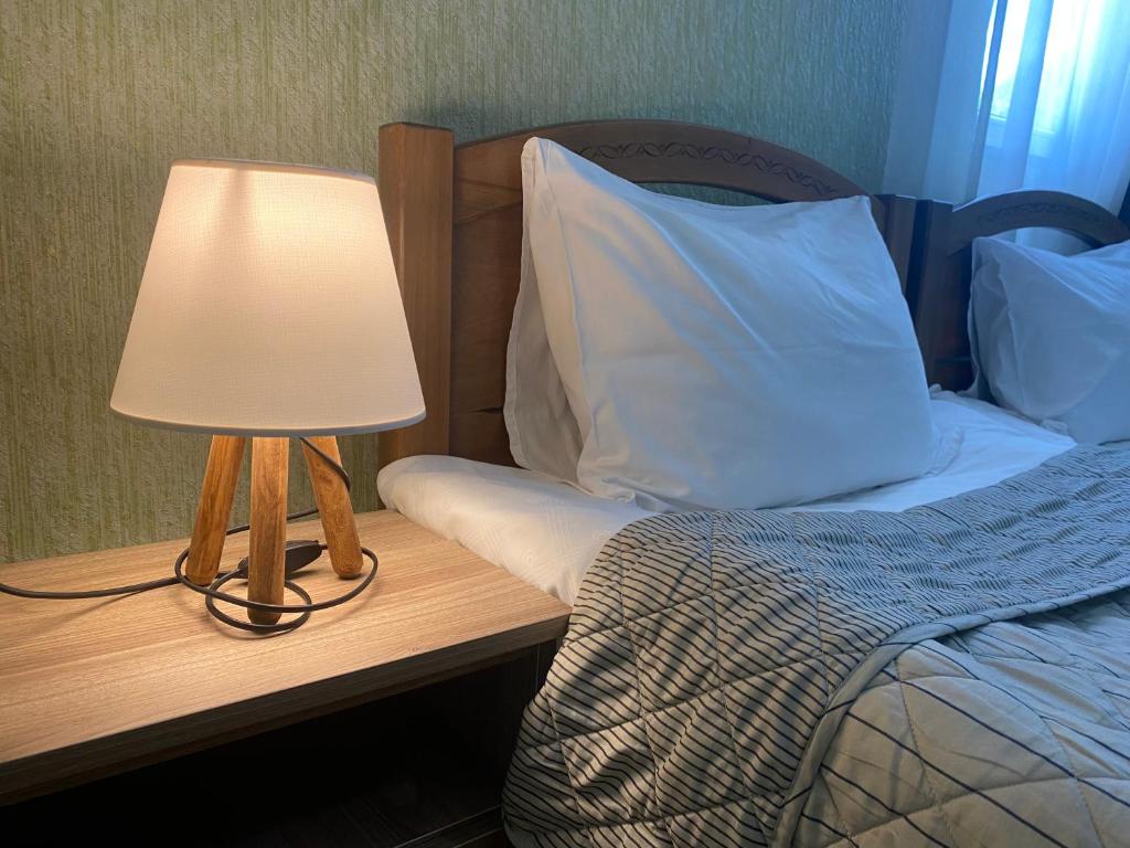Postel nebo postele na pokoji v ubytování Hillside Guesthouse