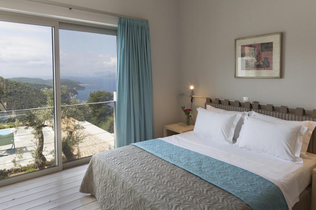 Postel nebo postele na pokoji v ubytování Atrium Villas