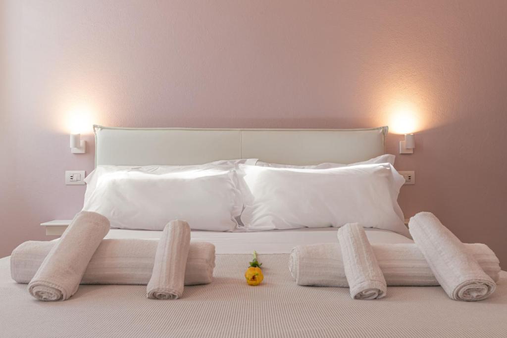 Postel nebo postele na pokoji v ubytování GLAM PARMA