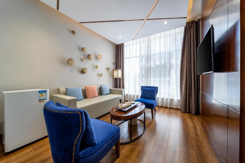 TV a/nebo společenská místnost v ubytování Milton Hotel