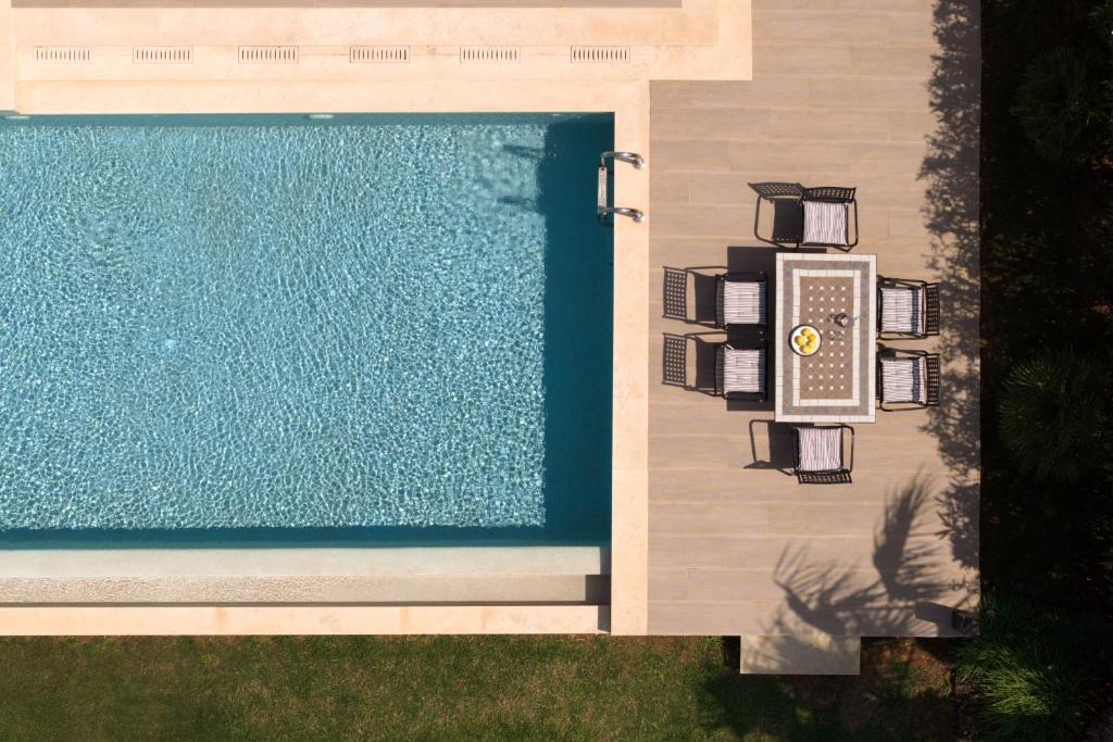 Bazén v ubytovaní Miraida Exclusive Residence alebo v jeho blízkosti