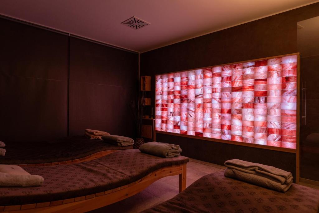 Postel nebo postele na pokoji v ubytování Aura Relais
