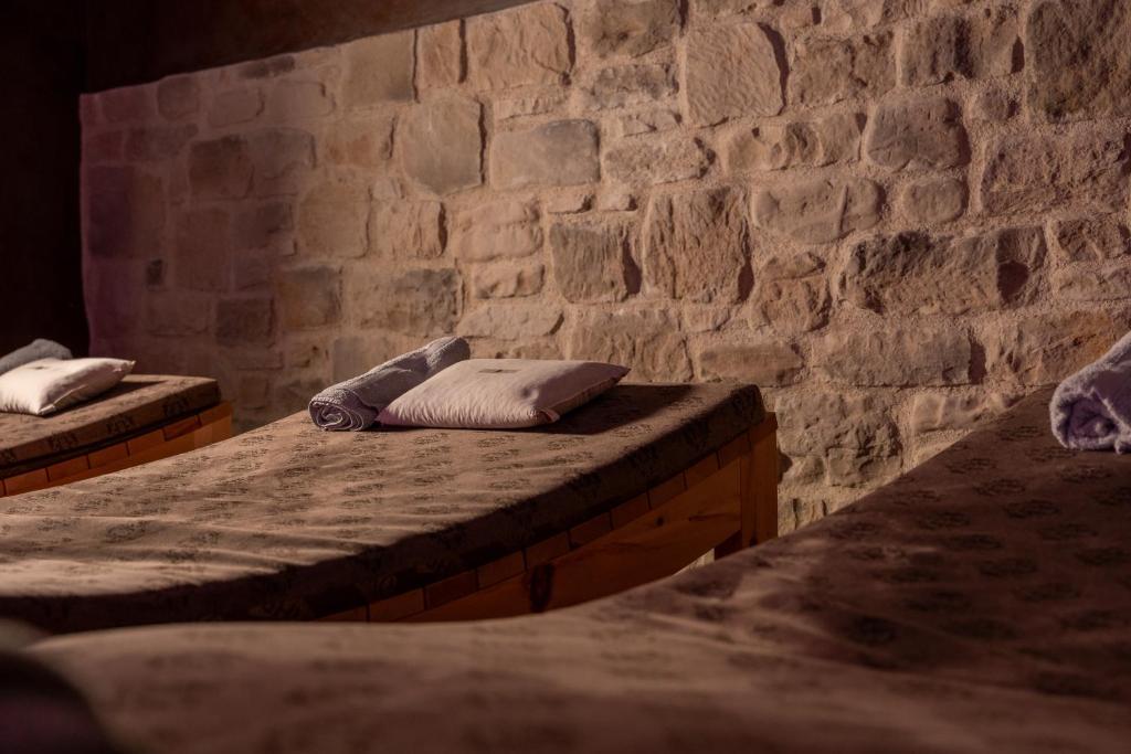 Postel nebo postele na pokoji v ubytování Aura Relais