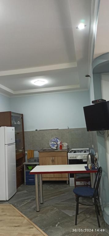 Kuchyň nebo kuchyňský kout v ubytování Apartments Lezzet