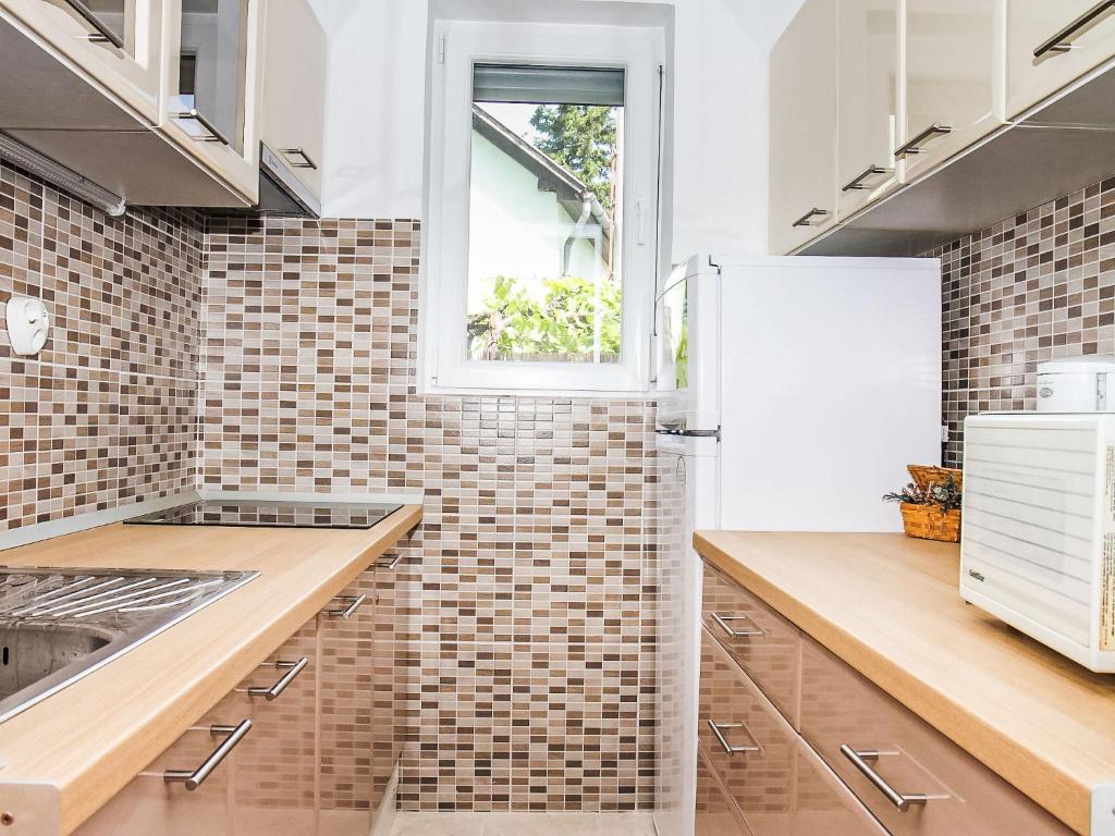 Kuchyňa alebo kuchynka v ubytovaní Holiday Home Gemini 2 by Interhome