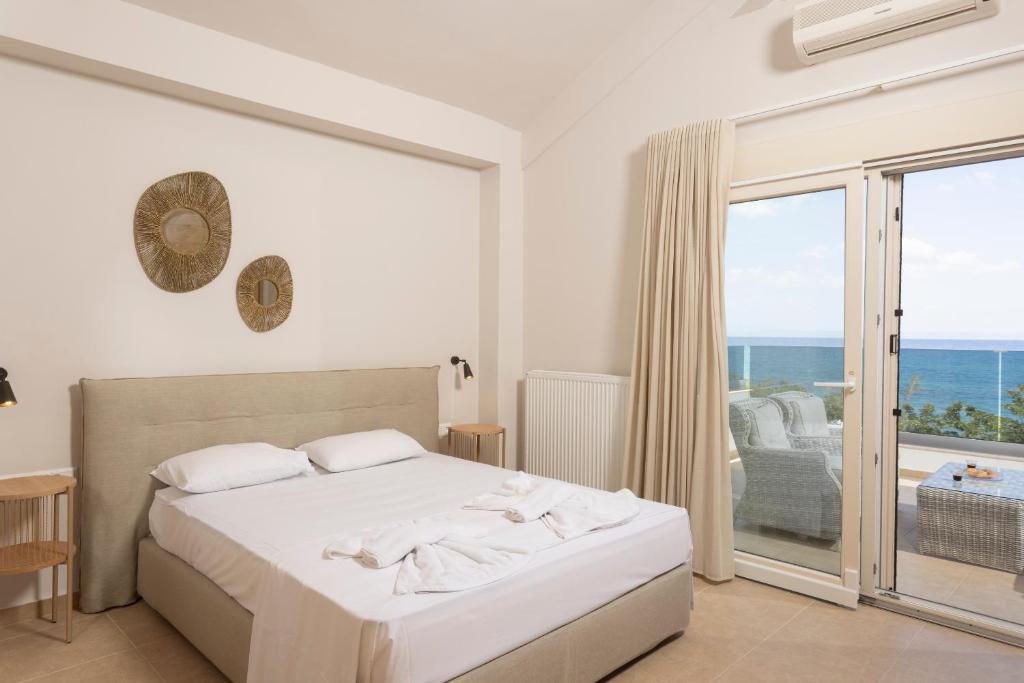 Posteľ alebo postele v izbe v ubytovaní Villa The View - Beachfront, 5 Bedrooms, BBQ, View