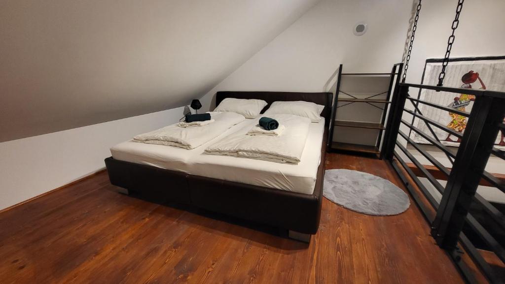 Postel nebo postele na pokoji v ubytování Apartmány pod Prašivou