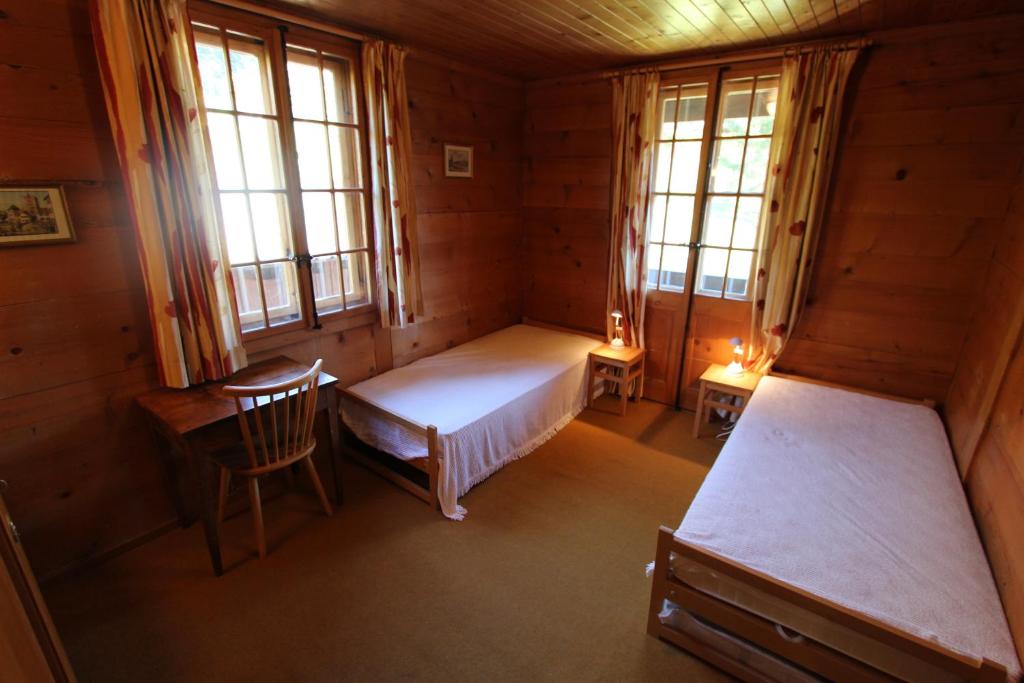 Postel nebo postele na pokoji v ubytování Arnica 1