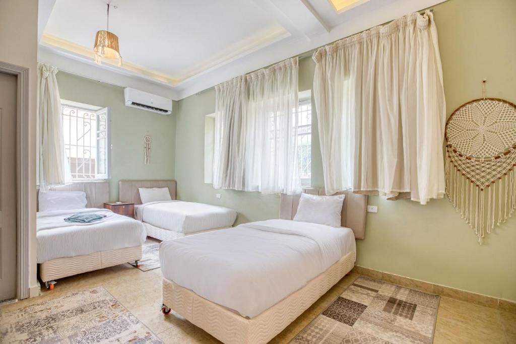 Villa Khufu Pyramids Hotel客房内的一张或多张床位
