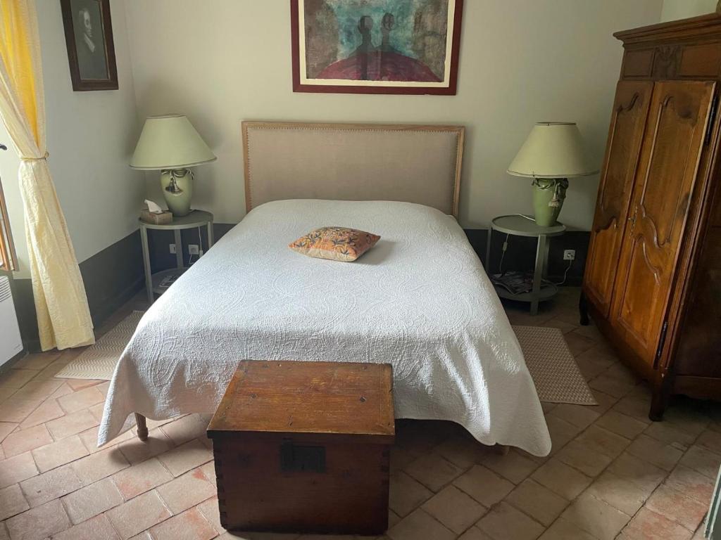 Letto o letti in una camera di Residence le Petit Paradis