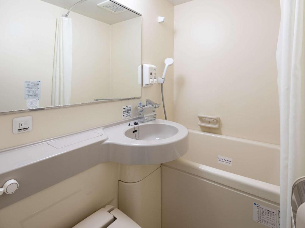 Koupelna v ubytování Comfort Hotel Kure
