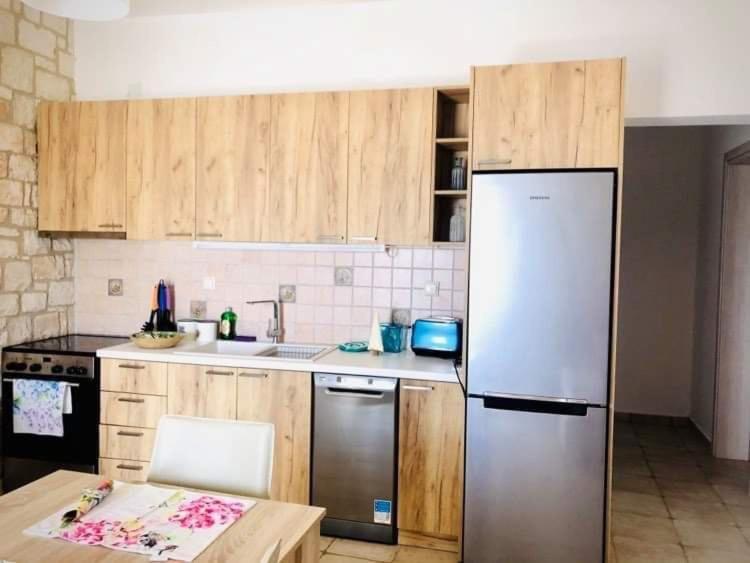 Kuchyň nebo kuchyňský kout v ubytování Deep Blue Villas