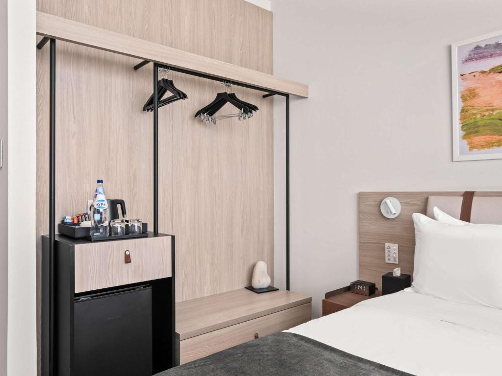 Postel nebo postele na pokoji v ubytování Mercure Larnaca City