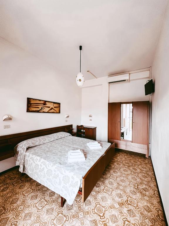 Postel nebo postele na pokoji v ubytování Hotel Paglierani - Nuova gestione 2024