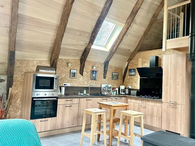 Kuchyň nebo kuchyňský kout v ubytování Gîte Le Couderc de Coubisou, grange rénovée