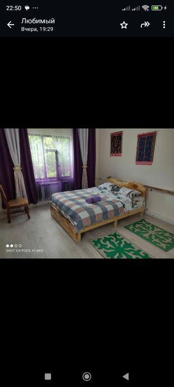 Postel nebo postele na pokoji v ubytování Barskoon Guest House