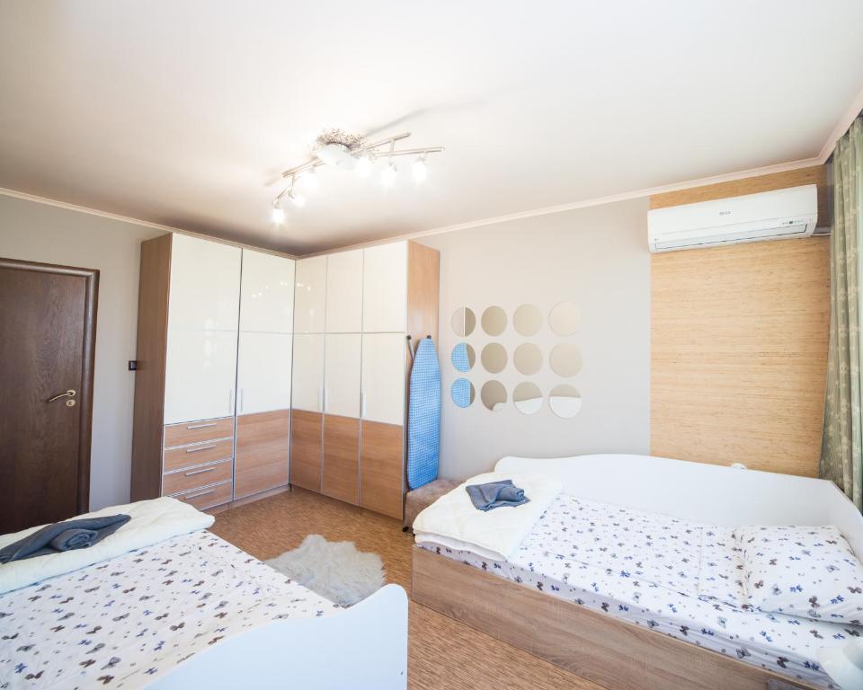 Postel nebo postele na pokoji v ubytování Premium Lazur - Sea garden Burgas - TOP Location 5 min to the Beach