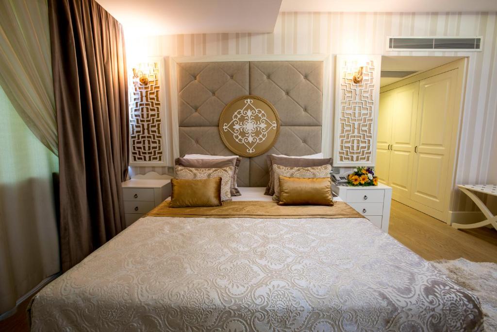 Postel nebo postele na pokoji v ubytování Fame Residence Kemer & Spa