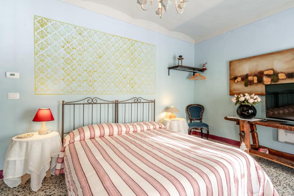 Postel nebo postele na pokoji v ubytování Ca' Pavaglione Country House