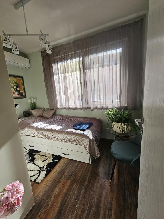 Postel nebo postele na pokoji v ubytování Bright Inn - Holiday & Business Apartment
