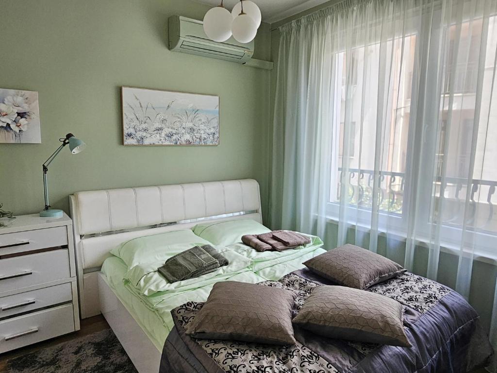 Postel nebo postele na pokoji v ubytování Bright Inn - Holiday & Business Apartment