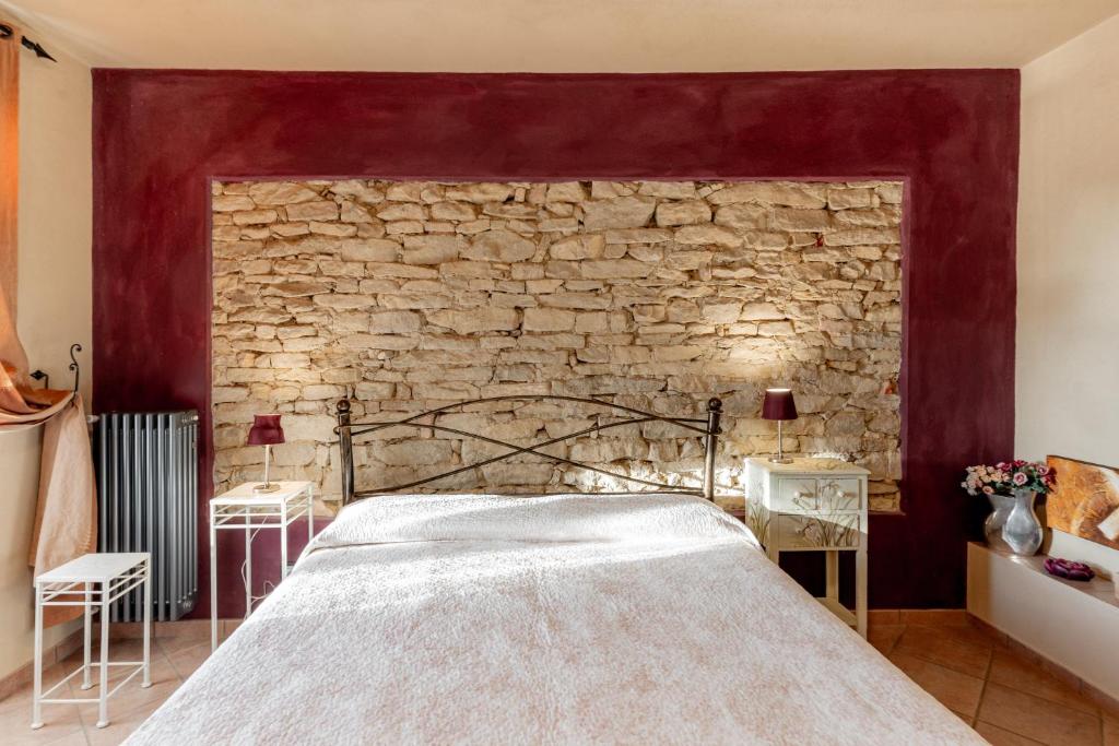 Postel nebo postele na pokoji v ubytování Ca' Pavaglione Country House