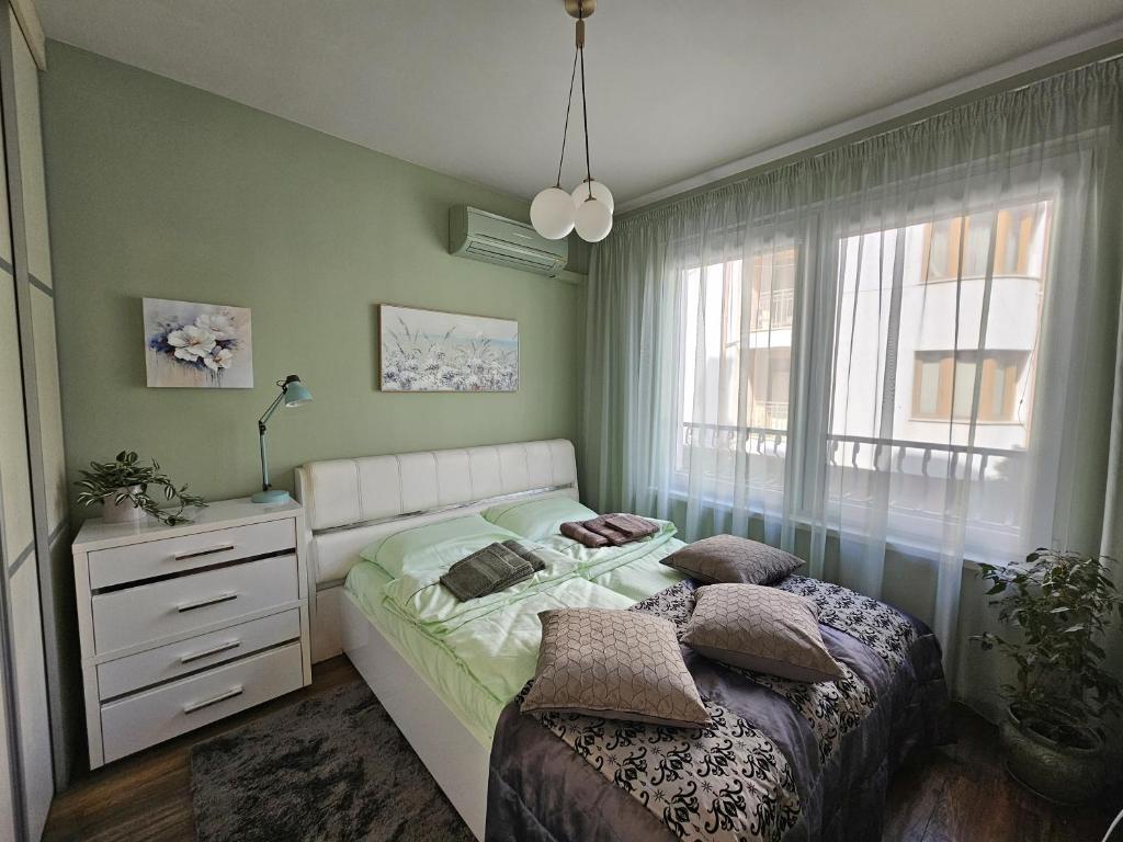 Postel nebo postele na pokoji v ubytování Bright Inn - Holiday & Business Apartment