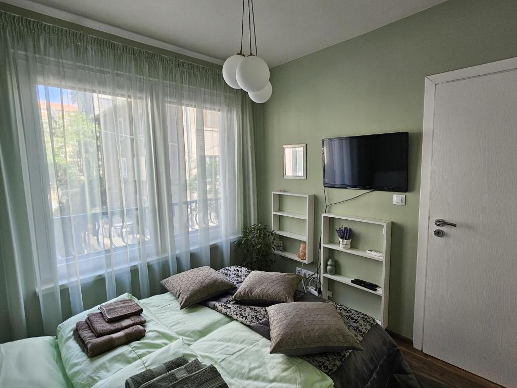 Postel nebo postele na pokoji v ubytování Bright Inn - Holiday & Business Apartment