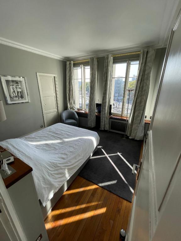 Photo de la galerie de l'établissement Chambre dans appartement luxueux, à Paris