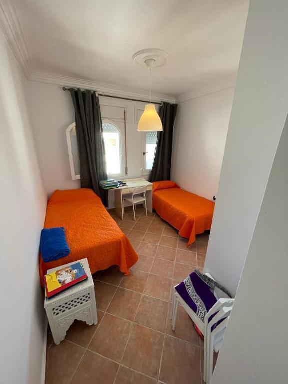 Postel nebo postele na pokoji v ubytování Appartement Martil Miramar, Tetouan