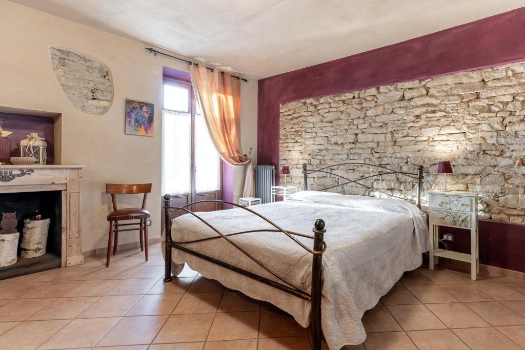 Postel nebo postele na pokoji v ubytování Ca' Pavaglione Country House