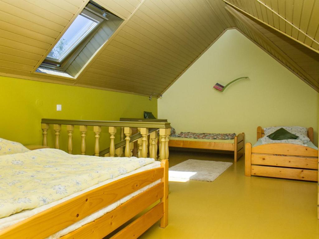 Posteľ alebo postele v izbe v ubytovaní Apartment Cortaderia 1 by Interhome