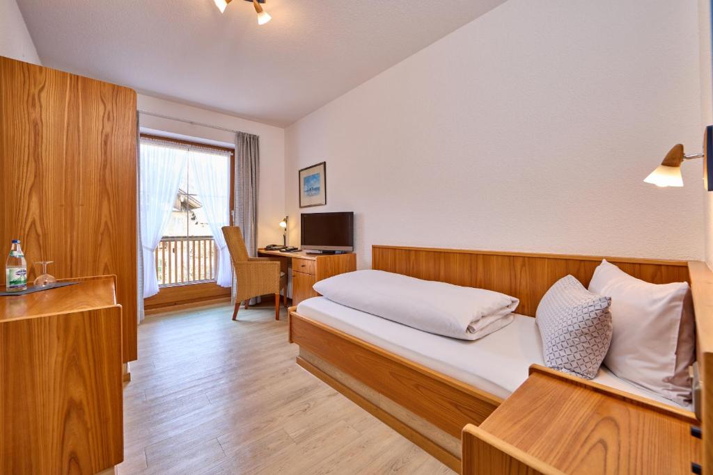 TV a/nebo společenská místnost v ubytování Hotel Antonia