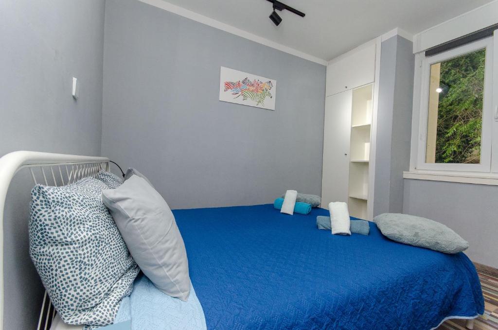 Posteľ alebo postele v izbe v ubytovaní Malena rooms