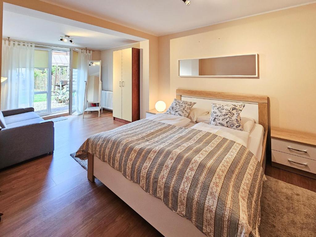 Ένα ή περισσότερα κρεβάτια σε δωμάτιο στο visit baltic - Rycerska