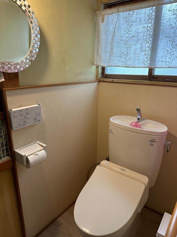 Koupelna v ubytování GuestHouse" Ro "Umegato