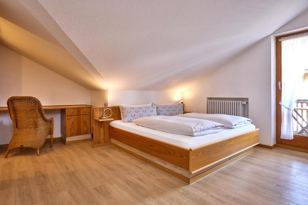Postel nebo postele na pokoji v ubytování Hotel Antonia