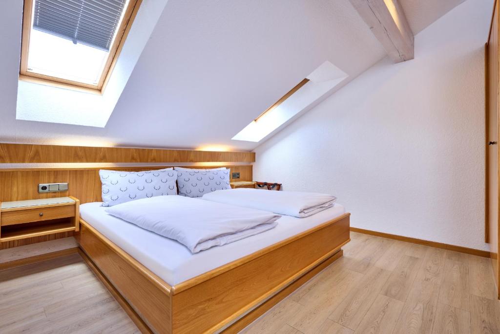 Postel nebo postele na pokoji v ubytování Hotel Antonia