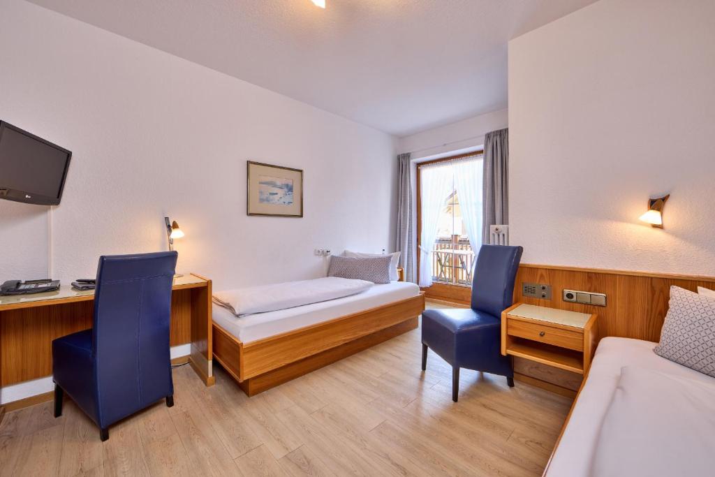 Postel nebo postele na pokoji v ubytování Hotel Antonia