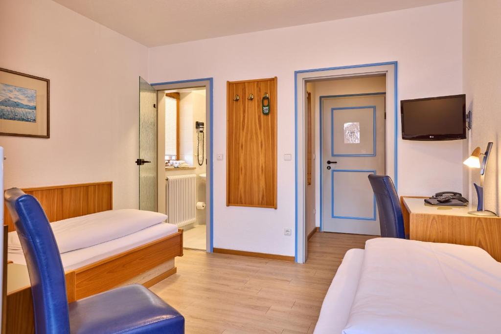 Postel nebo postele na pokoji v ubytování Hotel Antonia